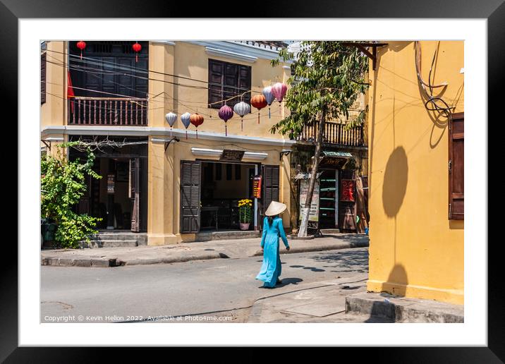 The girl in the blue dress Framed Mounted Print by Kevin Hellon