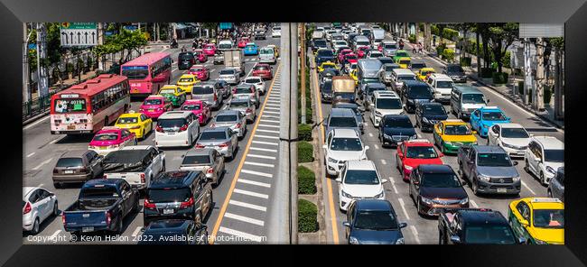 Bangkok rush hour traffic Framed Print by Kevin Hellon