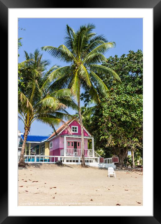 Pink Bungalow on the beach Framed Mounted Print by Kevin Hellon