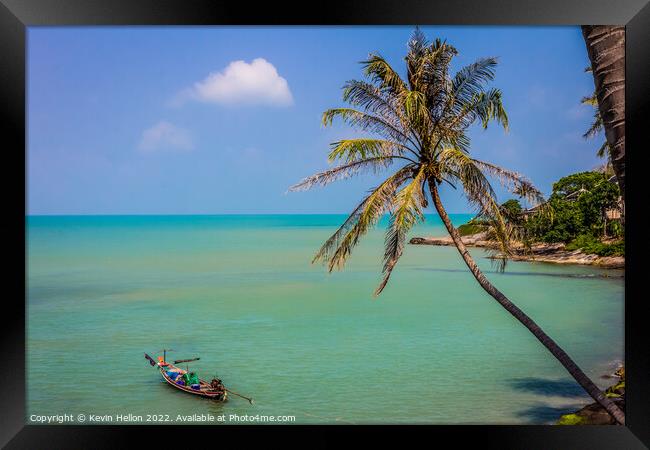 Cocnut palm and long tail boat Framed Print by Kevin Hellon