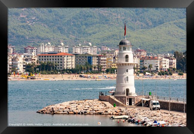 Lighthouse at entrance to Alanya Harbour, Turkey Framed Print by Kevin Hellon