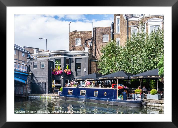 Narrowboat morred at the Grand Union pub  Framed Mounted Print by Kevin Hellon