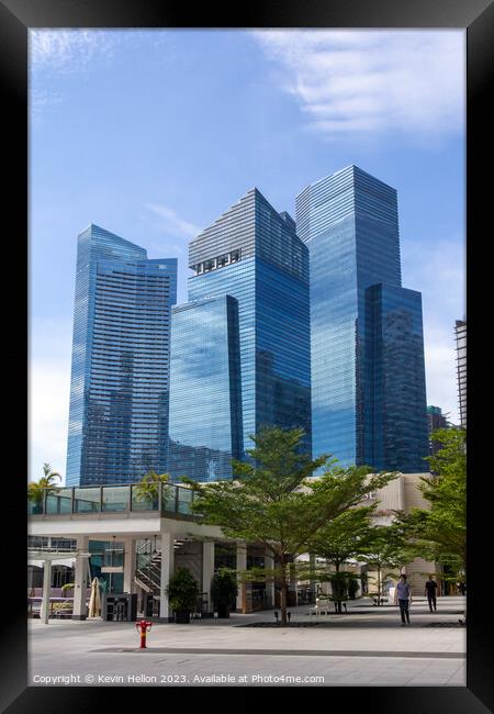 Modern high rise architecture, Singapore  Framed Print by Kevin Hellon
