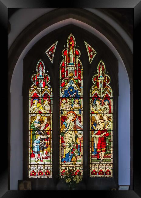 Stained glass window in St Dunstan's Church in Monks Risborough Framed Print by Kevin Hellon