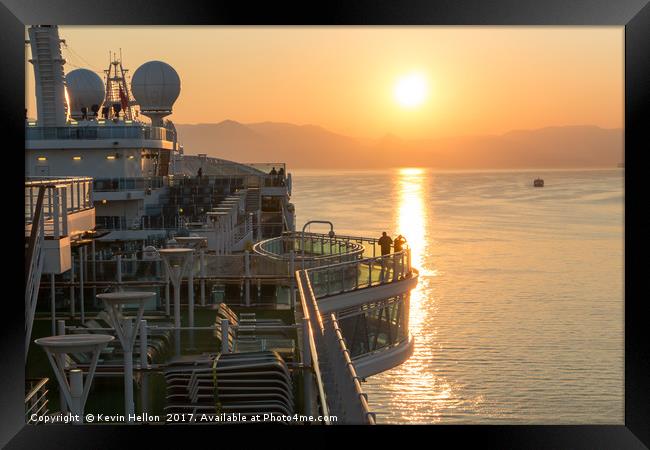 Sunrise over cruise ship Framed Print by Kevin Hellon