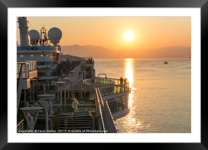 Sunrise over cruise ship Framed Mounted Print by Kevin Hellon
