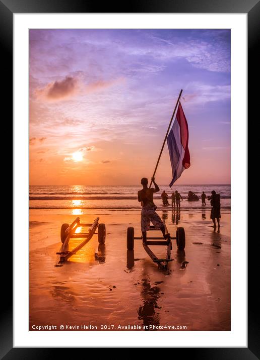 A jetski operator waves a flag Framed Mounted Print by Kevin Hellon