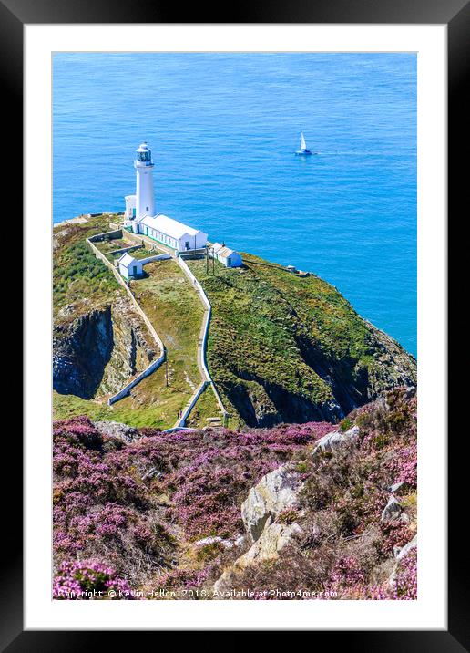 A yacht sails past the North Stack lighthouse Framed Mounted Print by Kevin Hellon