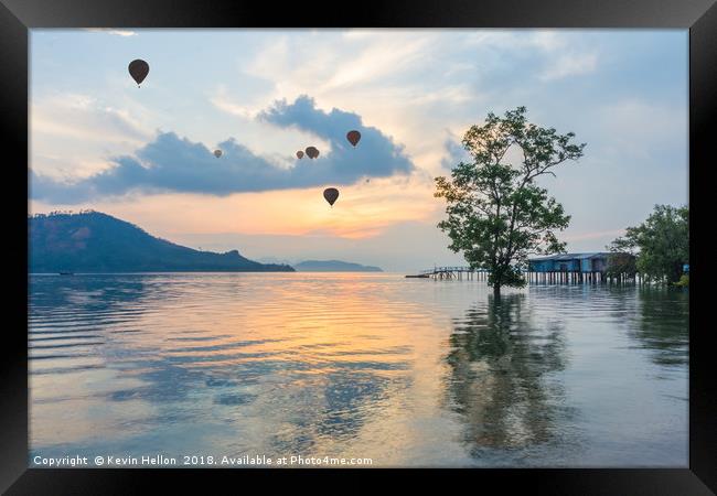 Hot air balloons and mangrove tree Framed Print by Kevin Hellon