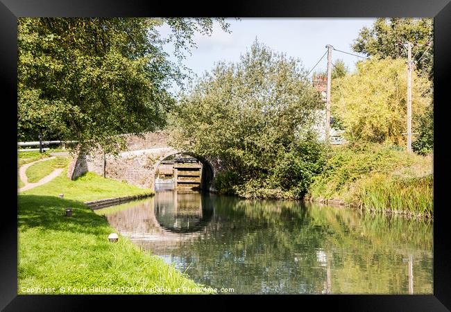 Bridge over  the Grand Union canal  Framed Print by Kevin Hellon
