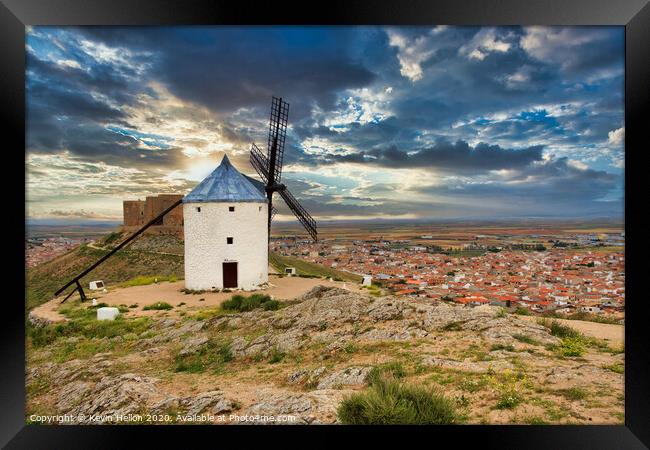 Windmill overlooking town of Consuegra, Spain Framed Print by Kevin Hellon