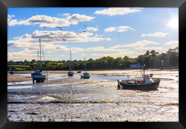 Boats at anchor in Red Wharf Bay Framed Print by Kevin Hellon