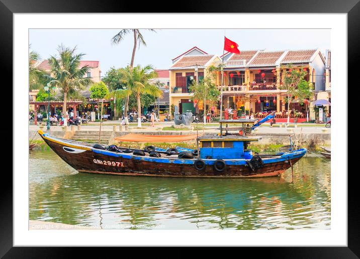 Fishing boat moored on the river  Framed Mounted Print by Kevin Hellon
