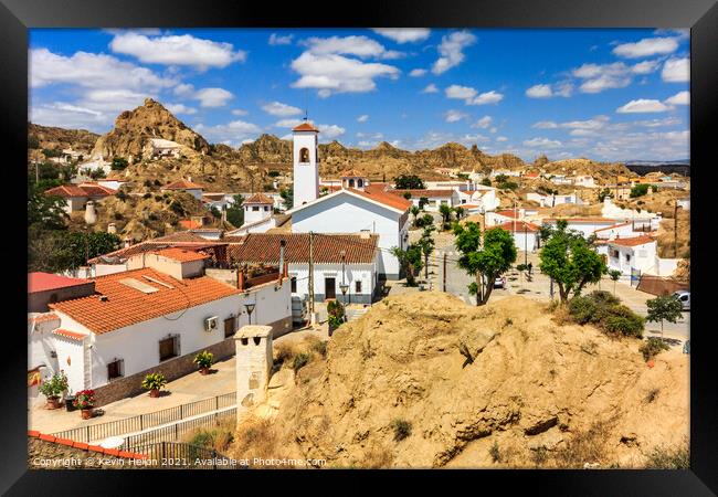 Cave house neighbourhood in Guadix Framed Print by Kevin Hellon
