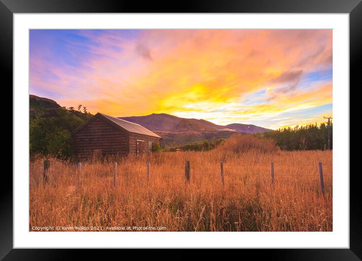 Sunrise over the Crown Mountains Framed Mounted Print by Kevin Hellon