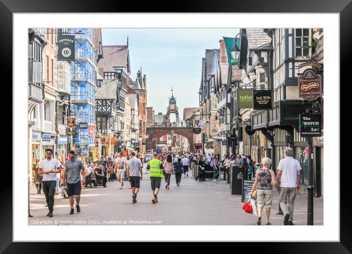 Shoppers walking in Eastgate street Framed Mounted Print by Kevin Hellon