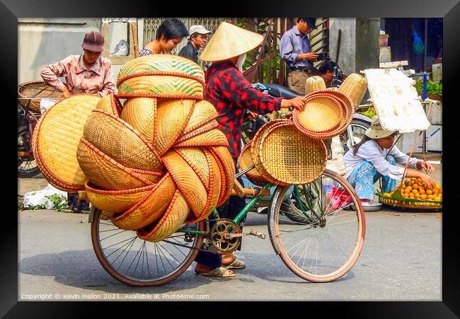Street vendor on bicycle Framed Print by Kevin Hellon