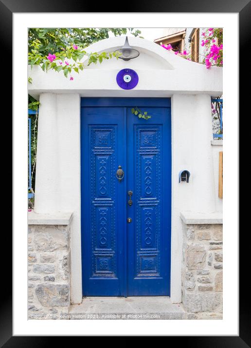 Blue door and entrance to a house  Framed Mounted Print by Kevin Hellon