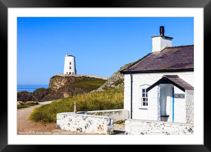 Pilot's cottage with lighthouse in the background Framed Mounted Print by Kevin Hellon