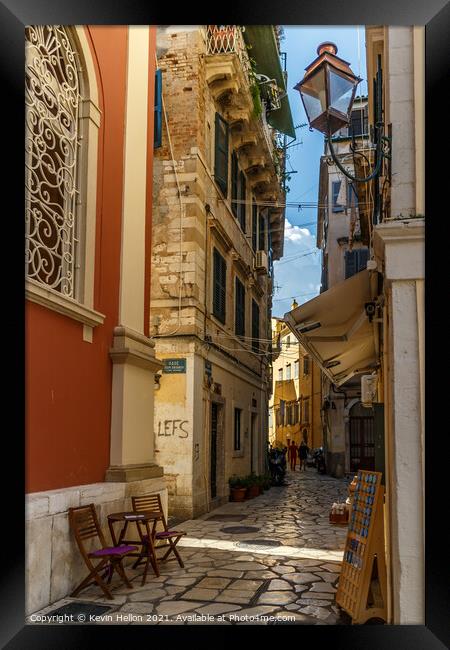 Narrow street in Corfu Town Framed Print by Kevin Hellon