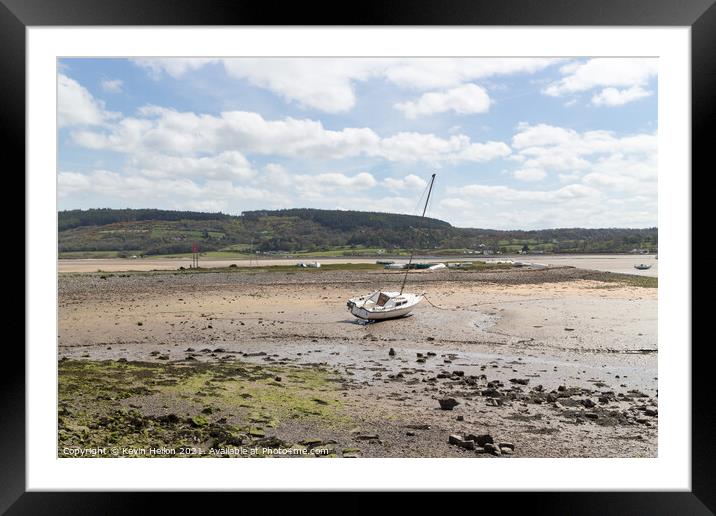 Boats moored in Red Wharf BayAnglesey at low tide. Framed Mounted Print by Kevin Hellon