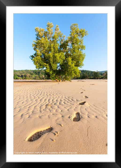 Footprints in the sand Framed Mounted Print by Kevin Hellon