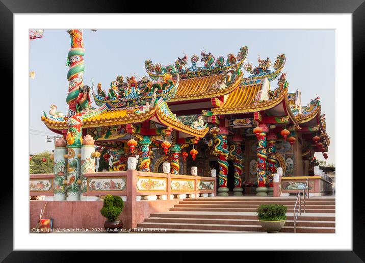 Chinese temple in the centre of the town.  Framed Mounted Print by Kevin Hellon