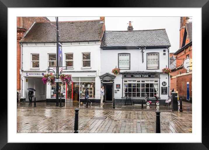 Man stood outside a pub smoking Framed Mounted Print by Kevin Hellon