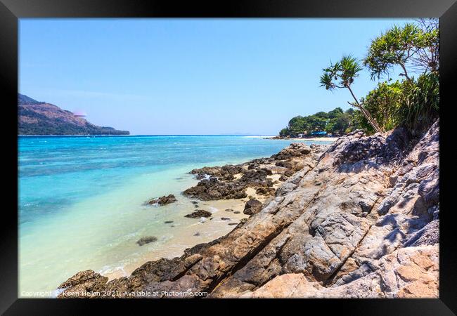 Rocks on the beach Framed Print by Kevin Hellon