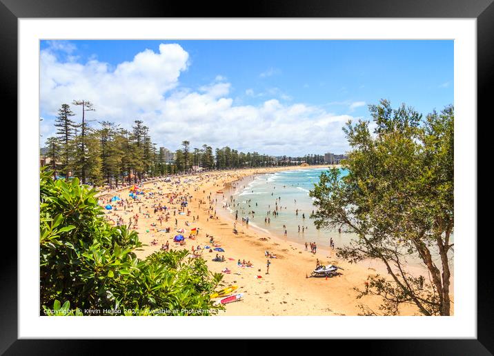 People sunbathing and enjoying Manly beach Framed Mounted Print by Kevin Hellon