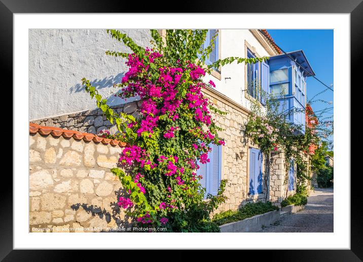 House with bougainvillaea Framed Mounted Print by Kevin Hellon