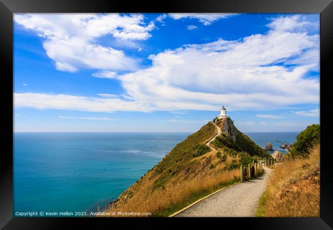 Pathway leading up to the lighthouse Framed Print by Kevin Hellon