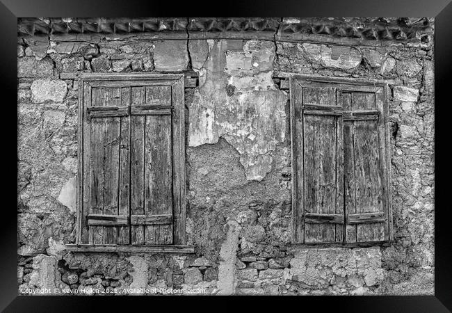 Old wooden window shutters Framed Print by Kevin Hellon