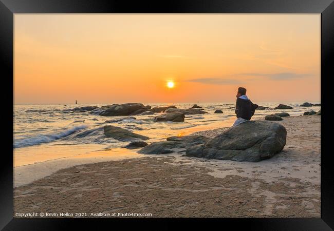 Sunrise over the rocks Framed Print by Kevin Hellon