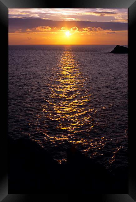 Sunset on the sea Framed Print by Bob Walker
