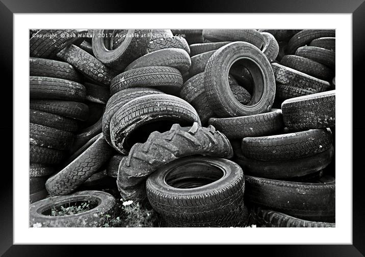 Pile of old tyres Framed Mounted Print by Bob Walker