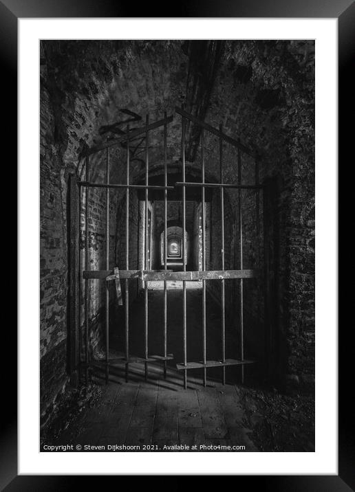 Black and white abandoned prison door Framed Mounted Print by Steven Dijkshoorn