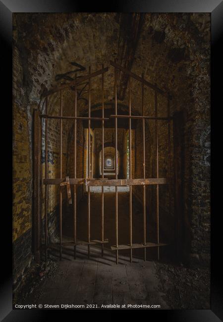 Abandoned prison door Framed Print by Steven Dijkshoorn