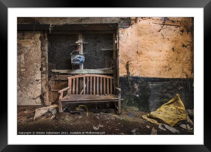 A lonely chair in an abandoned room Framed Mounted Print by Steven Dijkshoorn