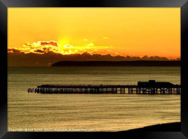 Hastings Pier at sunset Framed Print by Lee Sulsh