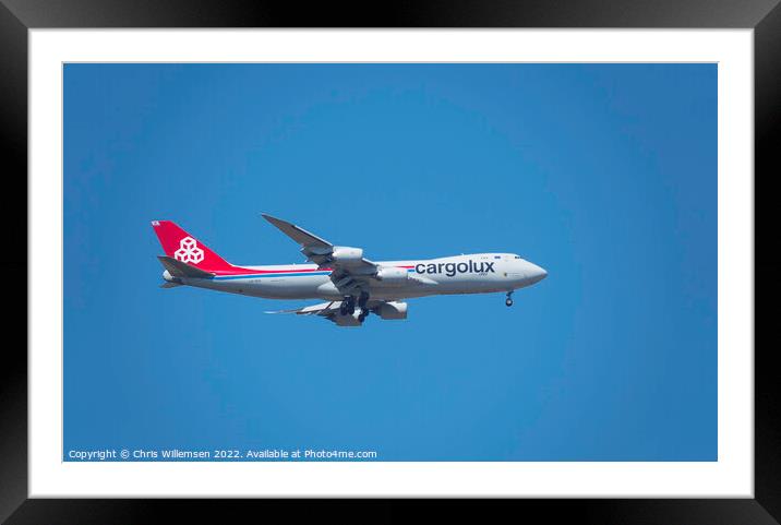 plane form luxair cargo in the blue sky on arrival Framed Mounted Print by Chris Willemsen
