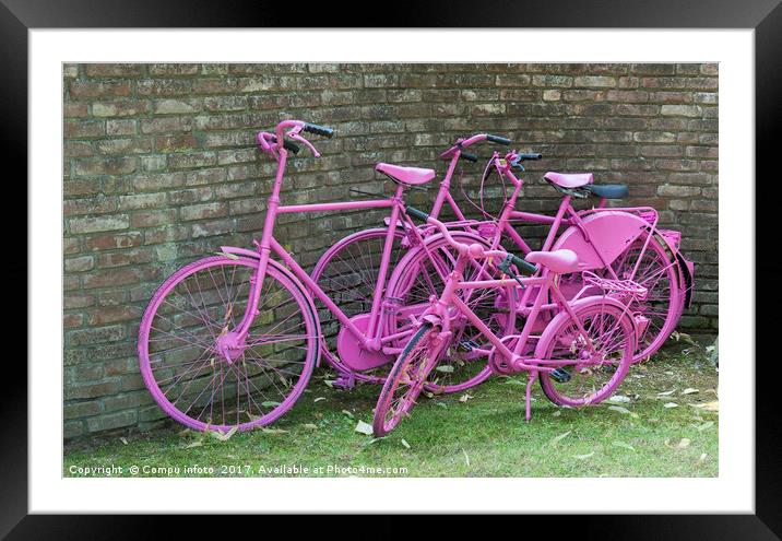 pink painted bikes and old wall Framed Mounted Print by Chris Willemsen