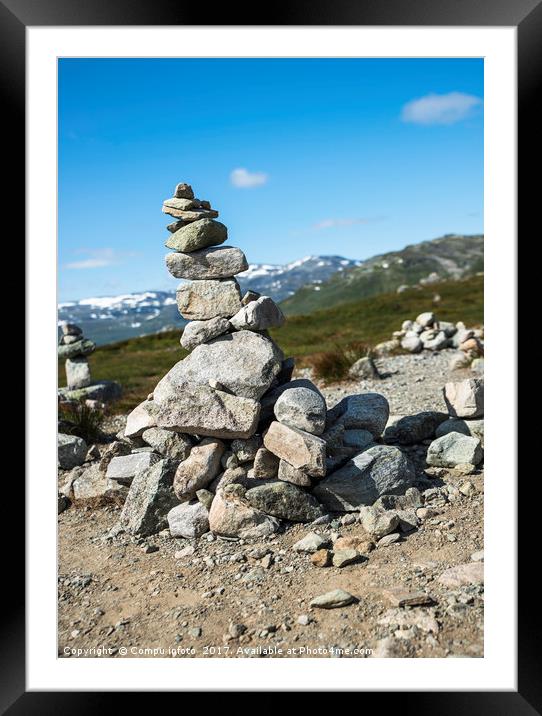 balanced stack of stones at Eidfjorden, Norway Framed Mounted Print by Chris Willemsen