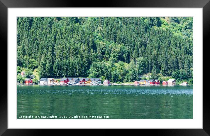 typical wooden houses at the sognefjord Framed Mounted Print by Chris Willemsen