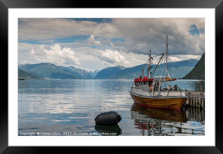 fishing boat in the harbor of Vik Framed Mounted Print by Chris Willemsen