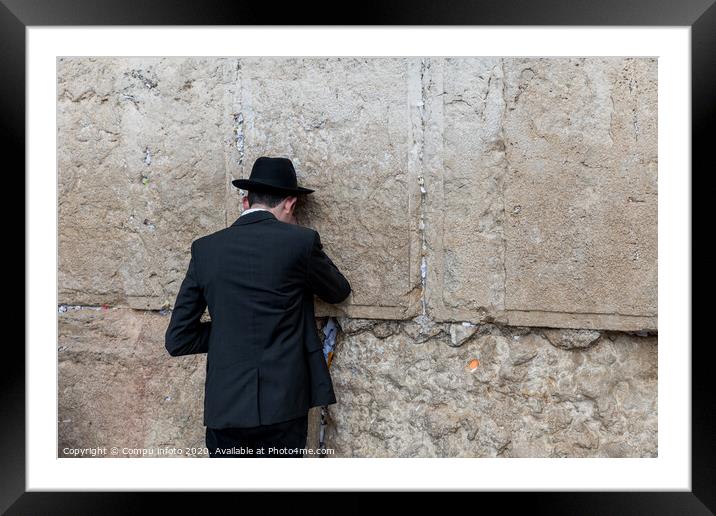 Jew at the wailing wall in jerusalem Framed Mounted Print by Chris Willemsen