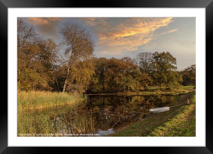 two boats in a pond with autumn colors Framed Mounted Print by Chris Willemsen