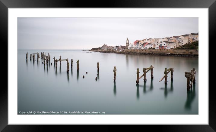 Fine art landscape image of derelict pier in milky long exposure seascape Framed Mounted Print by Matthew Gibson