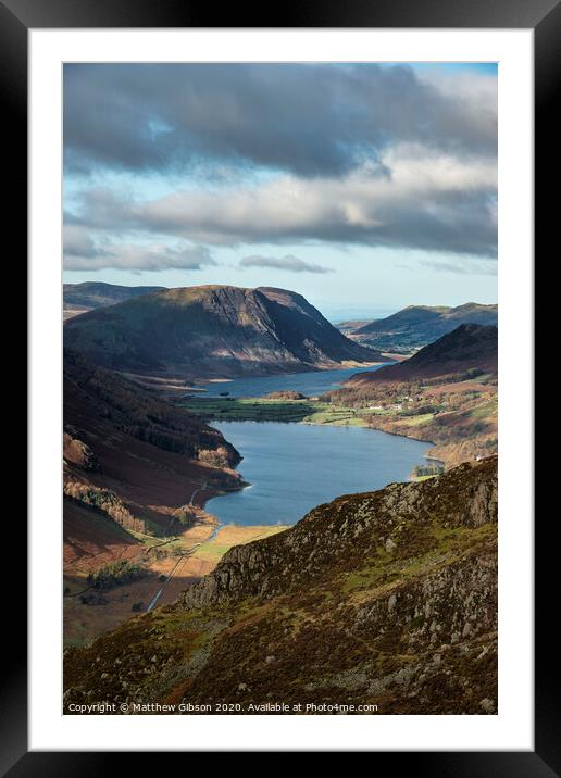 Majestic vibrant Autumn Fall landscape of Buttermere and Crummock Water flanked by mountain peaks of Haystacks High Stile and Mellbreak in Lake District Framed Mounted Print by Matthew Gibson