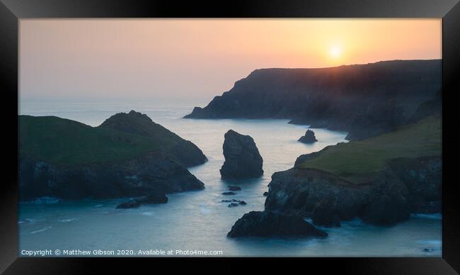 Stunning vibrant sunset landscape image of Kynance Cove on South Cornwall coast of England Framed Print by Matthew Gibson